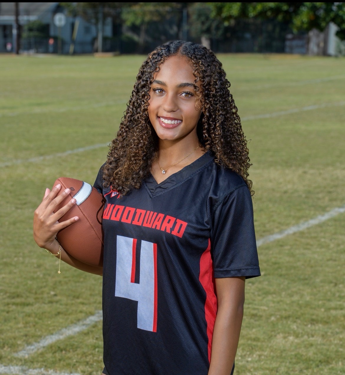 Corinne on the football field